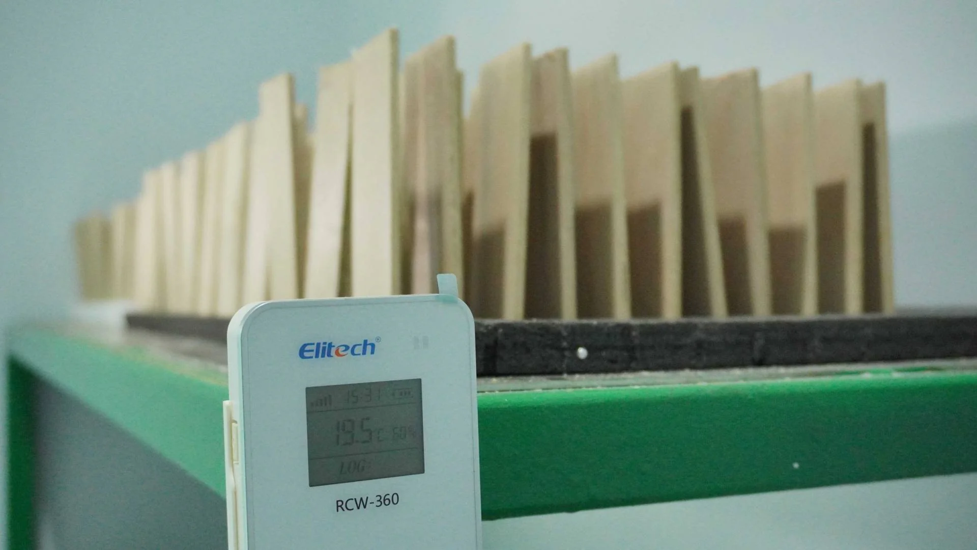 Wood samples arranged with testing equipment