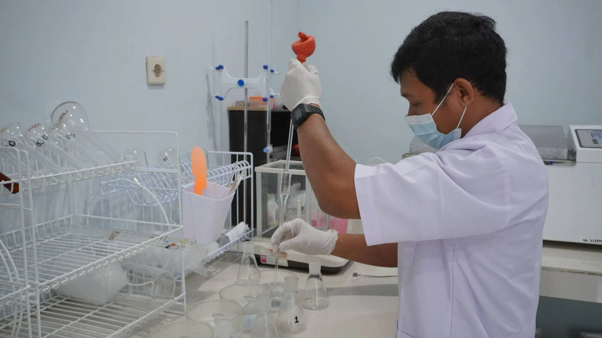 Laboratory technician checking product quality
